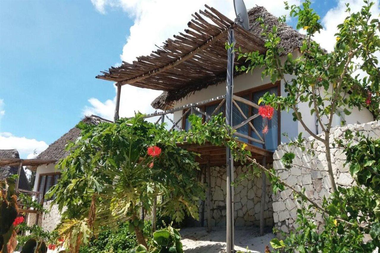 Zanbluu Beach Hotel Кивенга Екстериор снимка