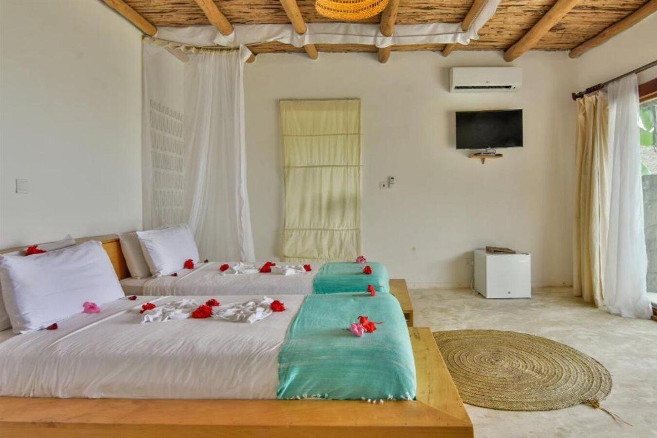 Zanbluu Beach Hotel Кивенга Екстериор снимка